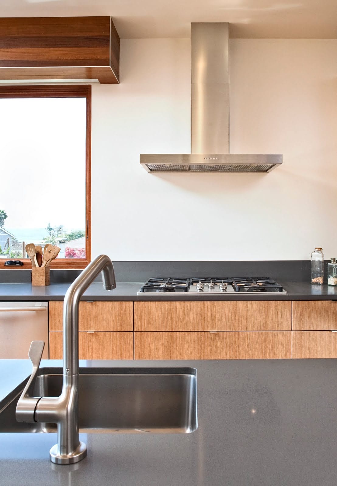 Kitchen design with architectural window coverings and shades